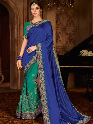Change your wardrobe and get classier outfits like this gorgeous Blue & TEal Green color silk fabrics and two tone silk saree. Ideal for party, festive & social gatherings. this gorgeous saree featuring a beautiful mix of designs. Its attractive color and designer embroidered design, patch design, stone, moti, heavy designer blouse, beautiful floral design work over the attire & contrast hemline adds to the look. Comes along with a contrast unstitched blouse.