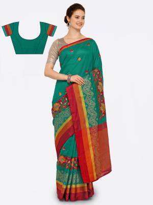 Grab This Lovely Shade Of Green With This Saree In Teal Green Color Paired With Teal Green Colored Blouse, This Saree And Blouse Are Fabricated On Cotton Art Silk Beautified With Contrasting Floral Embroidery. 