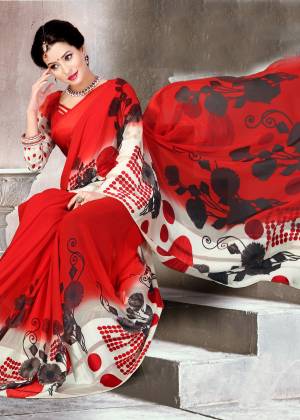 Adorn the Pretty Angelic Look Wearing This Saree In Red Color Paired With Red Colored Blouse. This Saree And Blouse Are Fabricated On Satin Silk Beautified With Bold Floral Prints All Over. This Saree Is Light Weight And Easy To Carry All Day Long.