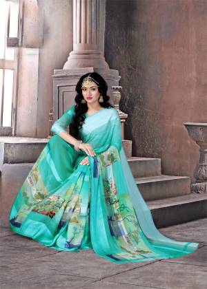 Very Pretty Shade In blue Is Here With This Saree In Aqua Blue Color Paired With Aqua Blue Colored Blouse. This Saree And Blouse are Fabricated On Satin Silk. Its Fabric Is Soft Towards Skin And Easy To Carry All Day Long.