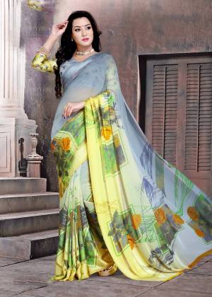 New And Unique Color Pallete IS Here With this Printed Saree In Grey And Yellow Color Paired With Grey And Yellow Colored Blouse. This Saree And Blouse Are Fabricated On Satin Silk Beautified With Prints.