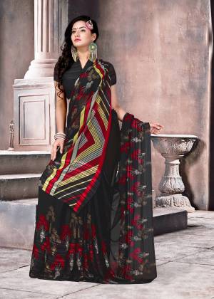 For a Bold And Beautiful Look, Grab This Saree In Black Color Paired With Black Colored Blouse. This Saree And Blouse Are Fabricated On Satin Silk Beautified With Multiple Prints All Over It.