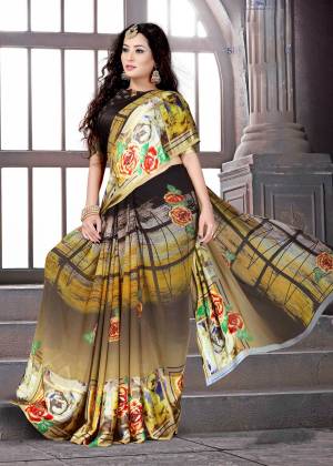 Go Colorful With This Saree In Multi Color Paired With Black Colored Blouse. This Saree and Blouse Are Fabricated On Satin Silk Beautified With Prints. It Is Light In Weight And Easy To Carry All Day Long.