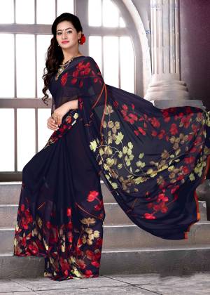 Enhance Your Personality Wearing This Saree In Navy Blue Color Paired With Navy Blue Colored Blouse. This Saree And Blouse Are Fabricated On Satin Silk Beautified With Floral Prints. Wear This As Your Casual Or Semi-Casual Wear.