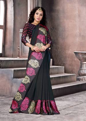 For a Bold And Beautiful Look, Grab This Saree In Black Color Paired With Black Colored Blouse. This Saree And Blouse Are Fabricated On Satin Silk Beautified With Multiple Prints All Over It.