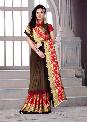 Attract All Wearing this Saree In Brown Color Paired With Brown And Red Colored Blouse. This Saree And Blouse are Fabricated On Satin Silk Beautified With Prints Over The Saree Border. Grab This Elegant Looking Saree Now.
