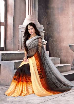 Tri-color Saree Is Here In Grey, Black And Cream Color Paired With Grey Colored Blouse. This Saree And Blouse Are Fabricated On Satin Silk. It Is Light Weight, Easy To Drape and Easy To Care For.