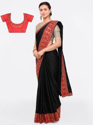 Enhance Your Beauty Wearing This Saree In Black Color Paired With Red Colored Blouse. This Pretty Designer Saree Is Fabricated On Silk Paired With Art Silk Fabricated Blouse. Both The Fabrics Ensures Superb Comfort And Give You A Rich Look. Buy This Saree Now.