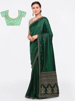 Shades Of Green Always Gives A Fresh And Lovely Look, So Grab This Saree In Dark Green Color Paired With Pastel Green Colored Blouse. This Saree Is Fabricated On Silk Paired With Pastel Green Colored Blouse. This Lovely Combination And Detailed Embroidery Will Earn You Lots Of Compliments From Onlookers.