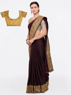Add This Very Pretty Saree To Your Wardrobe In Wine Color Paired With Beige Colored Blouse. This Saree Is Fabricated On Silk Paired With Art Silk Fabricated Blouse. It Has Embroidered Lace Border And Embroidered Blouse. Buy This Saree Now.