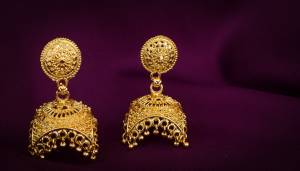 Add This Pretty Pair Of Jhumka Styled Earrings To Your Collection In Golden Color. Its New And Unique Square Pattern Will Earn You Lots Of Compliments From Onlookers. 