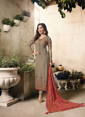 Flaunt Your Rich and Elegant Taste Wearing This Designer Suit In Grey Colored Top Paired With Grey Colored Bottom And Dark Peach Colored Dupatta. Its Top Is Fabricated On Georgette Paired With Santoon Bottom And Chiffon Dupatta. Buy It Now.