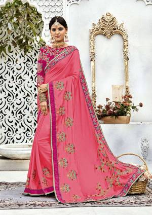 Look Pretty Wearing This Designer Saree In Pink Color Paired With Dark Pink Colored Blouse. This Saree Is Fabricated On Soft Silk Paired With Art Silk Fabricated Blouse. It Is Beautified With Heavy Embroidery Over The Saree And Blouse. Buy Now.