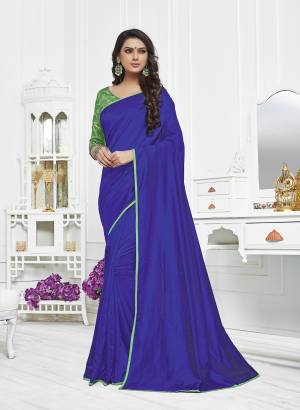 Grab This Saree In Royal Blue Color Paired With Contrasting Green Colored Blouse. This Saree Is Fabricated On Satin Silk Paired With Art Silk Fabricated Blouse. Both Its Fabrics Ensures Superb Comfort All Day Long. 