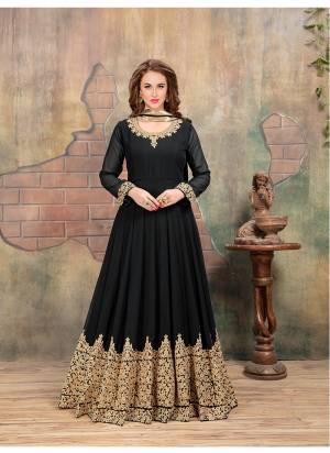 For A Bold And Beautiful Look, Grab This Designer Floor Length Suit In Black Color Paired With Black Colored Bottom And Dupatta. It Is Beautified With Coding Work Over The Panel. Buy This Suit Now.