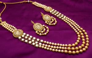To Your Ethnic Dress More Heavy Look, Grab This Lovely Necklace Set In Golden Color Which Can Be Paired With Colored Ethnic Dress Or Even A Simple Plain Kurti. Buy Now.