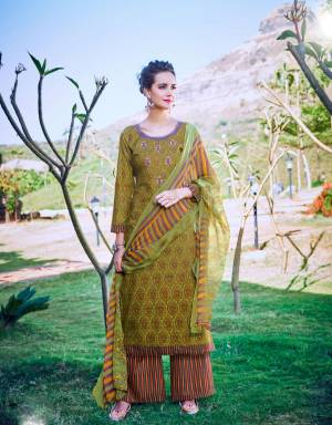 Add This New Shade Shade In Green With This Dress Material In Green Colored Top Paired With Multi Colored Bottom And Dupatta. Its Top and Bottom Are Fabricated On Cotton Paired With Chiffon Dupatta. It Is Light In Weight And Easy To Carry All Day Long.