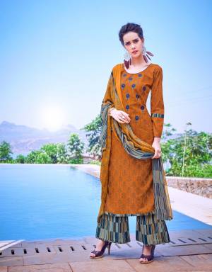 Be It A Casual Get-together Or Festive, Grab This Simple and Elegant Looking Dress Material In Musturd Yellow Color Paired With Grey and Blue Colored Bottom And Multi Colored Dupatta. Its Top And Bottom Are Fabricated On Cotton Paired With Chiffon Dupatta. This Suit Is Light Weight And Ensures Superb Comfort All Day Long.