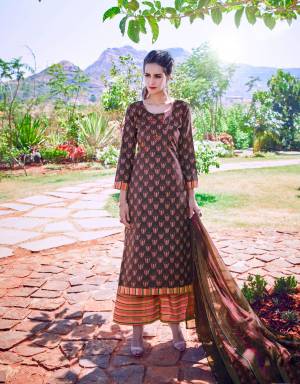 You Will Definitely Earn Lots Of Compliments Wearing This Suit In Brown And Peach Color Paired With Multi Colored Bottom And Dupatta. This Dress Material Is Fabricated On Cotton Paired With Chiffon Dupatta. Buy It Now.