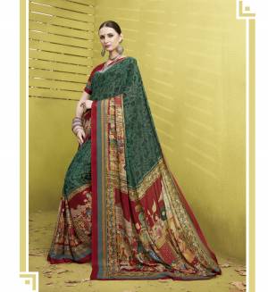 Add This New Shade In Green To Your Wardrobe With This Saree In Teal Green Color Paired With Contrasting Maroon Colored Blouse. This Saree And Blouse Are Fabricated On Cotton Silk Attractive Folk Prints Over The Saree. Buy Now.