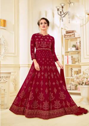 For A Royal Look, Grab This Designer Floor Length Suit In Maroon Color Paired With Maroon Colored Bottom And Dupatta. Its Top Is Fabricated On Georgette Paired With Santoon Bottom And Chiffon Dupatta. Its All Three Fabrics Ensures Superb Comfort All Day Long.  Buy It Now.