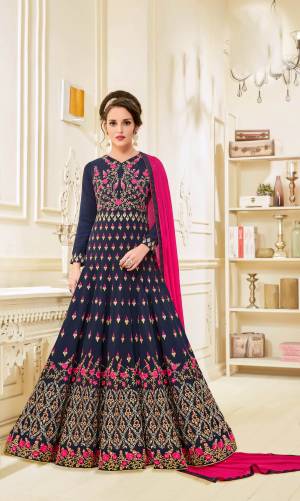 Enhance Your Personalityn With This Designer Floor Length Suit In Navy Blue Colored Floor Length Top Paired With Contrasting Pink Colored Bottom And Dupatta. Its Top Is Fabricated On Georgette Paired With Santoon Bottom And Chiffon Dupatta. This Suit Is Heavy Embroidery All Over Its Top. Buy Now.