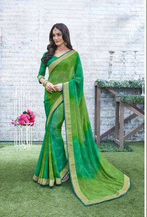 Add Some Casuals Wearing This Saree In Green Color Paired With Green Colored Blouse. This Saree And Blouse Are Fabricated On Georgette Beautified with Prints. This Saree Is Light Weight And Its Fabric Ensures Superb Comfort All Day Long.