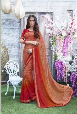 Grab This Saree In Red And Cream Color Which Has Cream Colored Base With Red Colored Prints All Over It, Paired With Red Colored Blouse. This Saree And Blouse Are Fabricated On Georgette Beautified With Prints All Over.