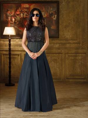 Enhance Your Personality, Wearing This Designer Floor Length Gown In Navy Blue Color With Imported Base Fabric Beautified With Embellishments Pipe Work And Also With 3D Yoke Fabric. Buy This Gown Now.
