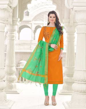 Orange Color Induces Perfect Summery Appeal To Any Outfit, So Grab This Dress Material In Orange Colored Top Paired With Contrasting Green Colored Bottom And Dupatta. Its Top And Bottom Are Fabricated On Cotton Paired With Banarasi Art Silk Dupatta. Buy Now.