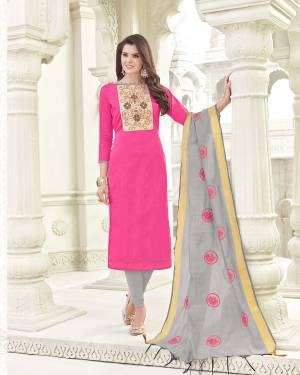 Here Is A Lovely Color Combiantion With This Dress Material In Pink Colored Top Paired With Contrasting Grey Colored Bottom And Dupatta. Its Top And Bottom Are Fabricated On Cotton Paired With Banarasi Art Silk Dupatta. Get This Stitched As Per Your Desired Fit And Comfort.