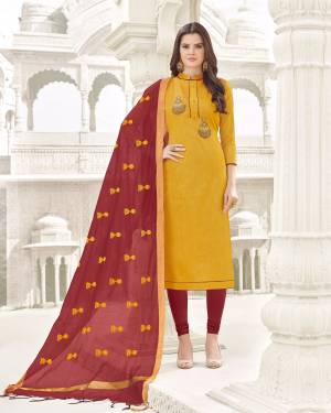 For A Rich Look, Grab This Dress Material In Yellow Colored Top Paired With Contrasting Maroon Colored Bottom And Dupatta. Its Top And Bottom Are Fabricated On Cotton Paired With Banarasi Art Silk, Get This Stitched As Per Your Desired Fit And Comfort And Get A Royal Look Like Never Before.