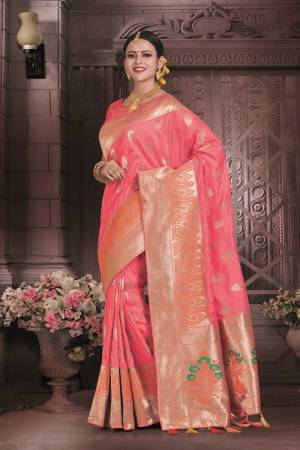 Shine Bright Wearing This Saree In Dark Peach Color Paired With Dark Peach Colored Blouse. This Saree And Blouse Are Fabricated On Art Silk Beautified With Weave All Over It. This Rich Looking Saree Is Suitable For All Occasion.