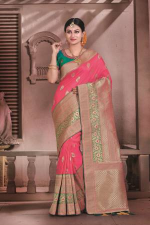 Attract All With This Saree In Dark Pink Color Paired With Contrasting Teal Green Coloree Blouse. This Saree And Blouse Are Fabricated On Art Silk Beautified With Weave All Over It. Buy This Pretty Saree Now.