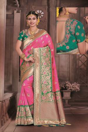 Look Pretty Wearing This Saree In Pink Color Paired With Contrasting Teal Green Colored Blouse. This Saree And Blouse Are Fabricated On Art Silk Beautified With Weave Over the Saree And Embroidered Blouse.  Buy This Saree Now.