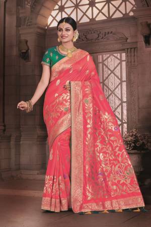Look Pretty Wearing This Saree In Dark Peach Color Paired With Contrasting Teal Green Colored Blouse. This Saree And Blouse Are Fabricated On Art Silk Beautified With Weave Over the Saree And Embroidered Blouse.  Buy This Saree Now.