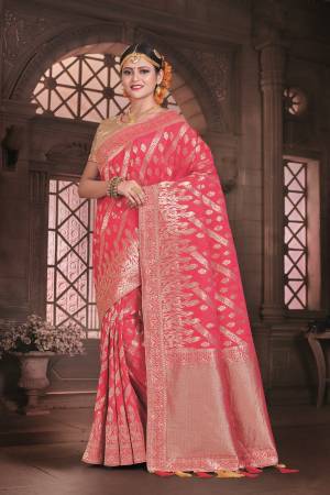 For A Royal Look In Silk, Grab This Saree In Pink Color Paired With Golden Colored Blouse. This Saree And Blouse Are Fabricated On Art Silk Beautified With Weave All Over. This Saree Is Light In Weight And Easy To Carry All Day Long. 