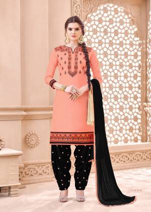 If Those Readymade Suit Does Not Lend You The Desired Comfort, Than Grab This Dress Material In Peach Colored Top Paired With Black Colored Bottom And Dupatta. Its Top And Bottom Are Fabricated On Cotton Paired With Chiffon Dupatta. Buy it Now.