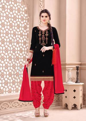 For A Bold And Beautiful Look, Grab This Elegant Looking Dress Material In Black Colored Top Paired With Red Colored Bottom and Dupatta. Its Top And Bottom Are Fabrictaed On Cotton Paired With Chiffon Dupatta. Buy It Now.