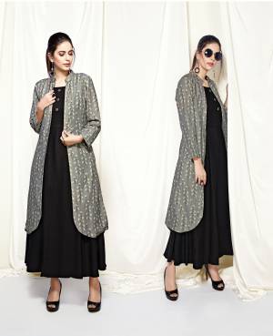 For A Bold And Beautiful Look, Grab This Designer Readymade Kurti In Black Color Paired With Grey Colored Jacket Beautified With Small Prints All Over It. Buy This Readymade Kurti Now.