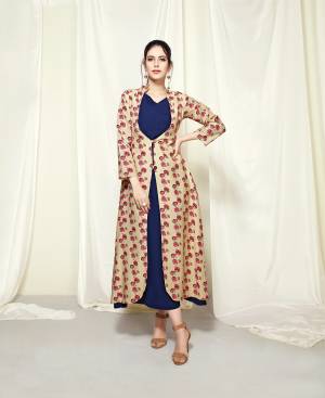 Flaunt Your Rich And Elegant Taste Wearing This Lovely Designer Readymade Kurti In Royal Blue Color Paired With Cream Colored Blouse. This Kurti And Jacket Are Fabricated On Muslin Beautified With Floral Prints All Over The Jacket. Buy Now.