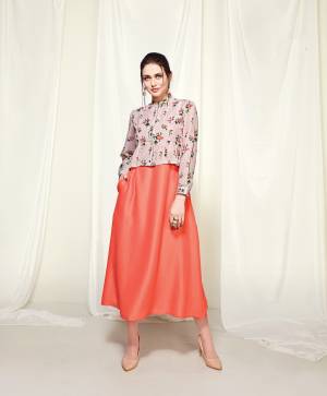 Colors Add Beauty To Any Attire, So Grab This Pretty Kurti In Dark Peach Color Paired With Dusty Pink Colored Jacket. This Kurti And Jacekt Are Fabricated On Muslin Beautified With Prints. It Is Light In Weight And Its Fabric Ensures Superb Comfort All Day Long.