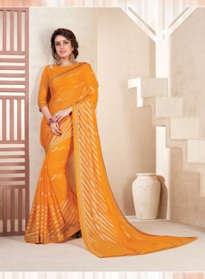 Simple And Elegant Looking Saree Is Here In Musturd Yellow Color Paired With Musturd Yellow Colored Blouse. This Saree Is Fabricated On Chiffon Brasso Paired With Art Silk Fabricated Blouse. This Pretty Saree Will Earn You Lots Of Compliments From Onlookers.