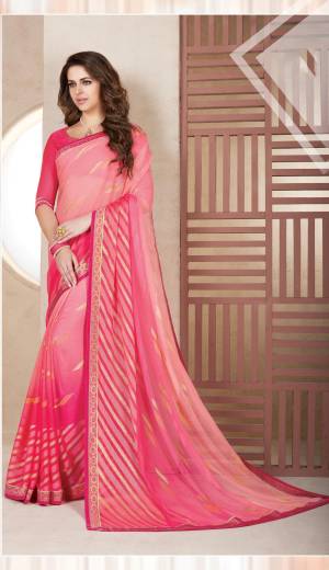 Look Pretty Wearing This Saree In Pink Color Paired With Pink Colored Blouse. This Saree Is Fabricated On Chiffon Brasso Paired With Art Silk Fabricated Blouse. It Has Pretty Simple Prints Which Gives An Elegant Look To Your Personality.