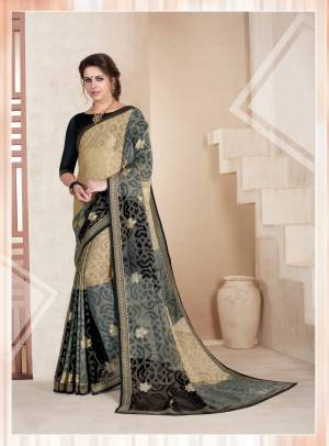 Add This Beautiful Saree To Your Wardrobe With Rich Color Combination In Cream And Black Color Paired With Black Colored Blouse. This Saree Is Fabricated On Chiffon Brasso Paired With Art Silk Fabricated Blouse. Buy This Saree Now.