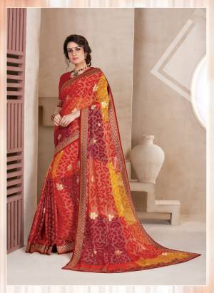 Here Is A Proper Traditional Look With This Saree In Red And  Yellow Color Paired With Contrasting Red Colored Blouse. This Saree Is Fabricated On Chiffon Brasso Paired With Art Silk Fabricated Blouse. Its Bright Color Combination Will Give You An Attractive Look.