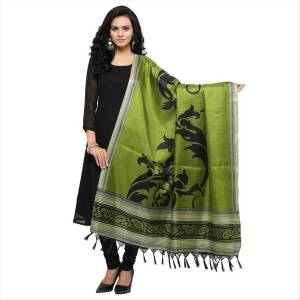 Simple And Elegant Looking Dupatta Is Here In Green Color Fabricated On Cotton Art Silk Beautified With Bold Printed Motif. It Can Be Paired With Green, Black Or White Colored Suit.