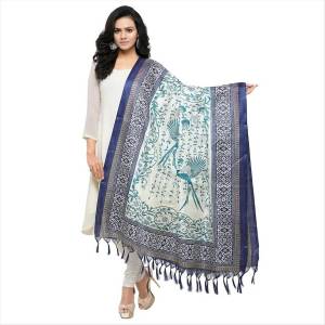 Very Pretty, Simple And Elegant Looking Dupatta Is Here In White and Blue Color Fabricated On Cotton Art Silk Beautified With Prints All Over It. It Is Light Weight And Can Be Paird With Any Contrasting Or White Colored Suit. Buy Now.