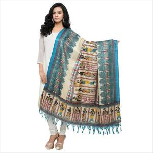 Very Pretty, Simple And Elegant Looking Dupatta Is Here In White and Blue Color Fabricated On Cotton Art Silk Beautified With Prints All Over It. It Is Light Weight And Can Be Paird With Any Contrasting Or White Colored Suit. Buy Now.