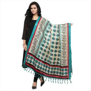 Very Pretty, Simple And Elegant Looking Dupatta Is Here In White and Turquoise Blue Color Fabricated On Cotton Art Silk Beautified With Prints All Over It. It Is Light Weight And Can Be Paird With Any Contrasting Or White Colored Suit. Buy Now.